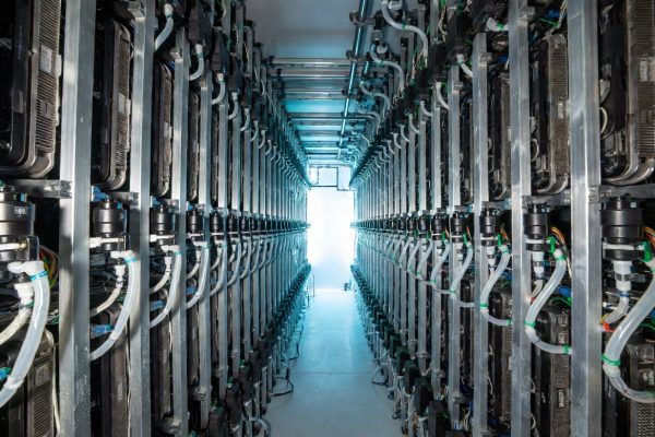 water-cooled server aisle in an AI data center for large language models, visible liquid cooling pipes and subtle condensation.