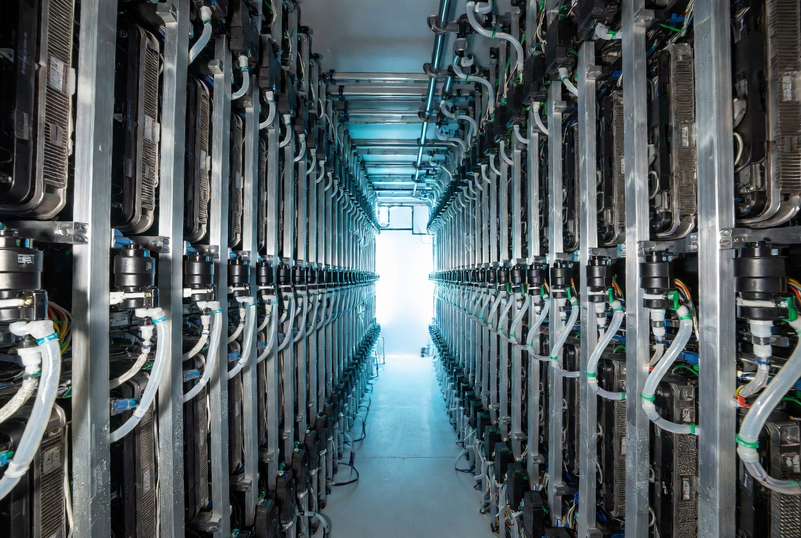 water-cooled server aisle in an AI data center for large language models, visible liquid cooling pipes and subtle condensation.