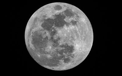 High-resolution view of the full Moon with visible surface features including dark maria and bright crater rays.
