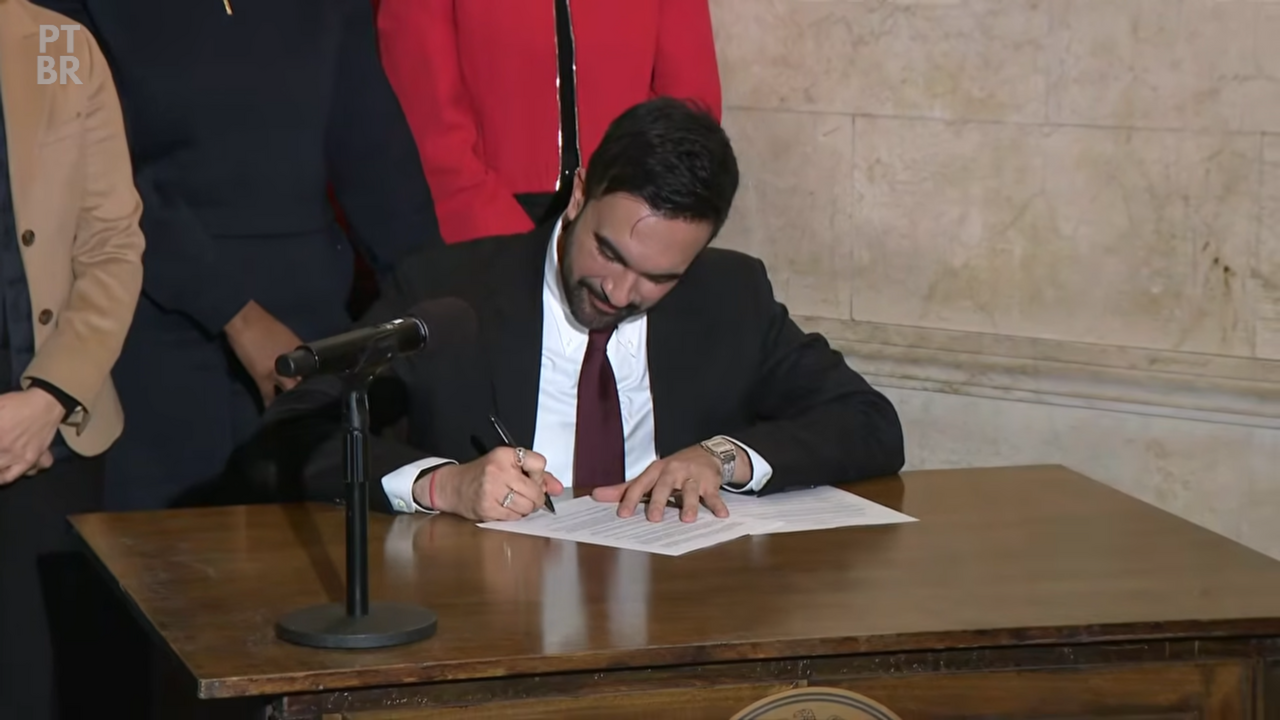 Mayor Zohran Mamdani signs an order. Credit: NYC Mayor’s Office, CC BY 4.0.