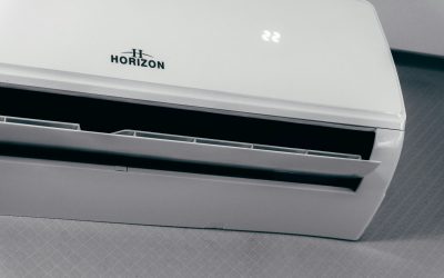 White Horizon wall-mounted mini-split indoor unit with the display set to 22 and the front vent open.